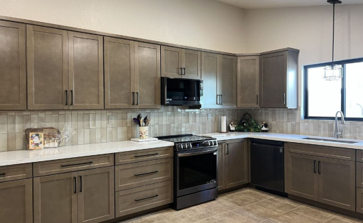 Meet the perfect kitchen combination: Maple Latte cabinetry and Cera Gleeze Beige backsplash. [TWD Project Location: Scottsdale, AZ]