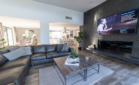 Cultured stone panels from floor to ceiling give this Family Room a whole new modernized and masculine look. [TWD Project Location: Litchfield Park, AZ]