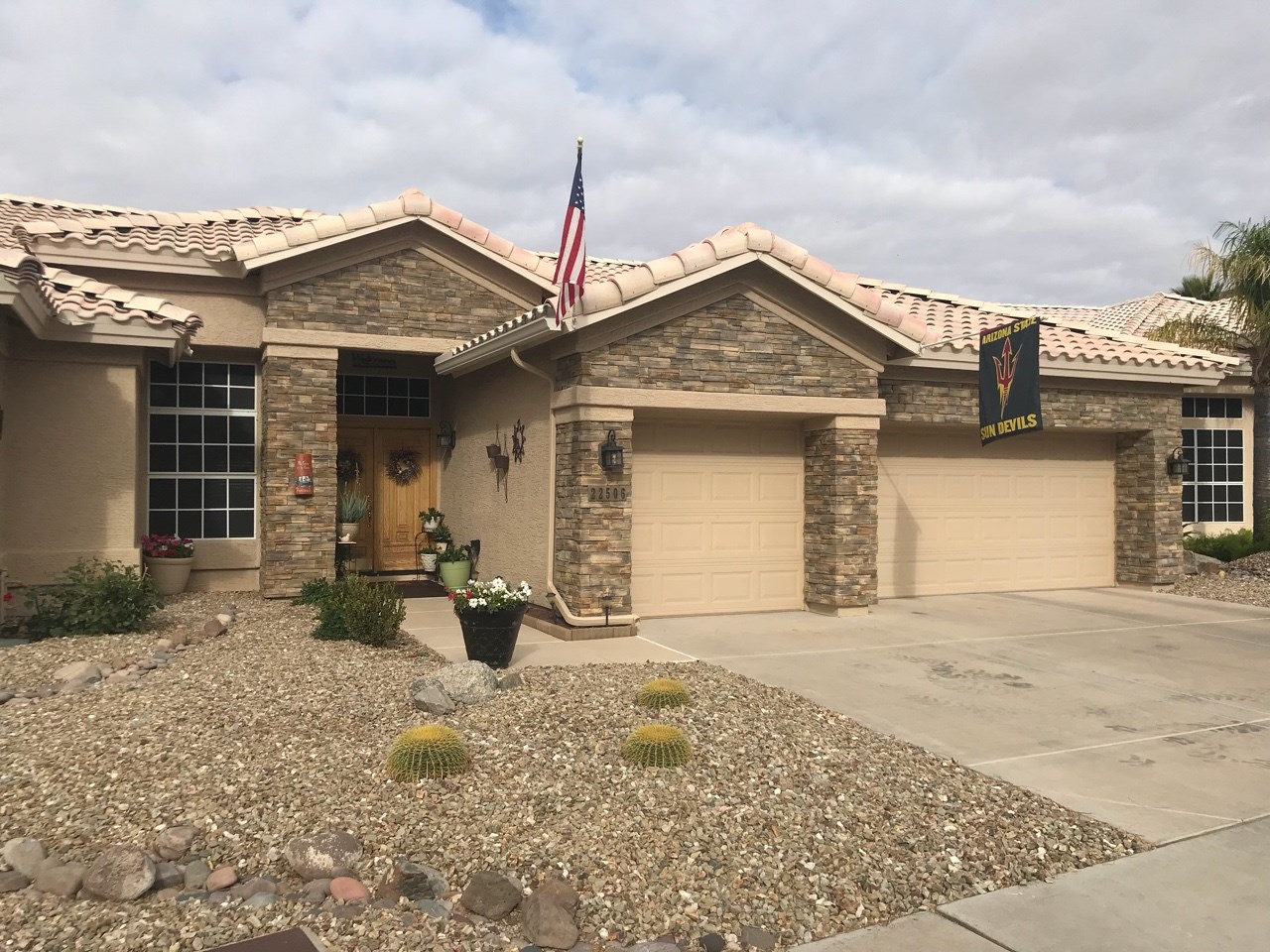 Supply and install rustic stone veneer at the front of the home. [TWD Project Location: Glendale, AZ]