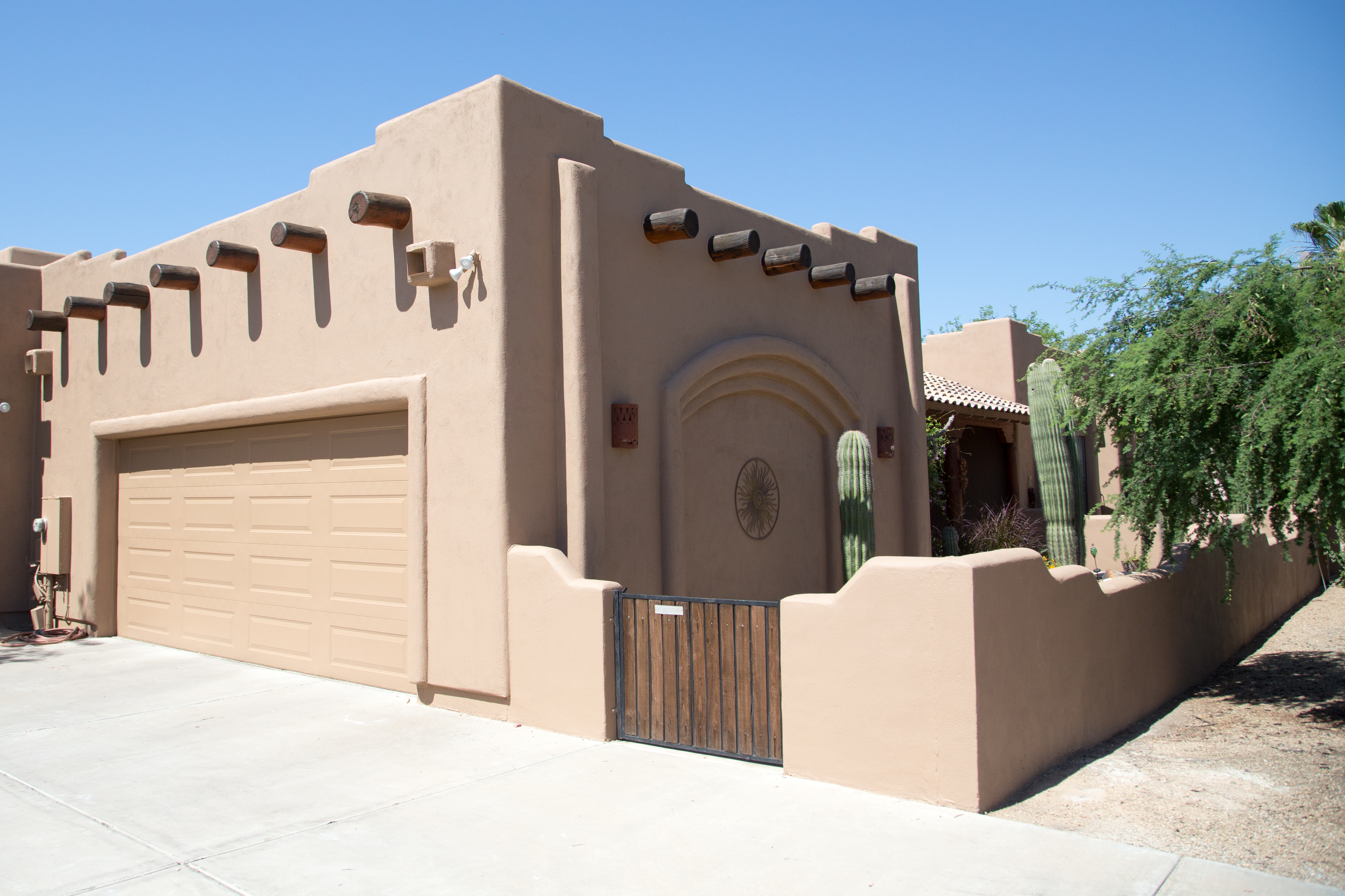 TWD was honored to work on this beautiful Phoenix home giving it new life by performing necessary stucco repairs, adding fresh exterior 2-tone paint and re-sealing the deco wood beams. [TWD Project Location: Phoenix, AZ]