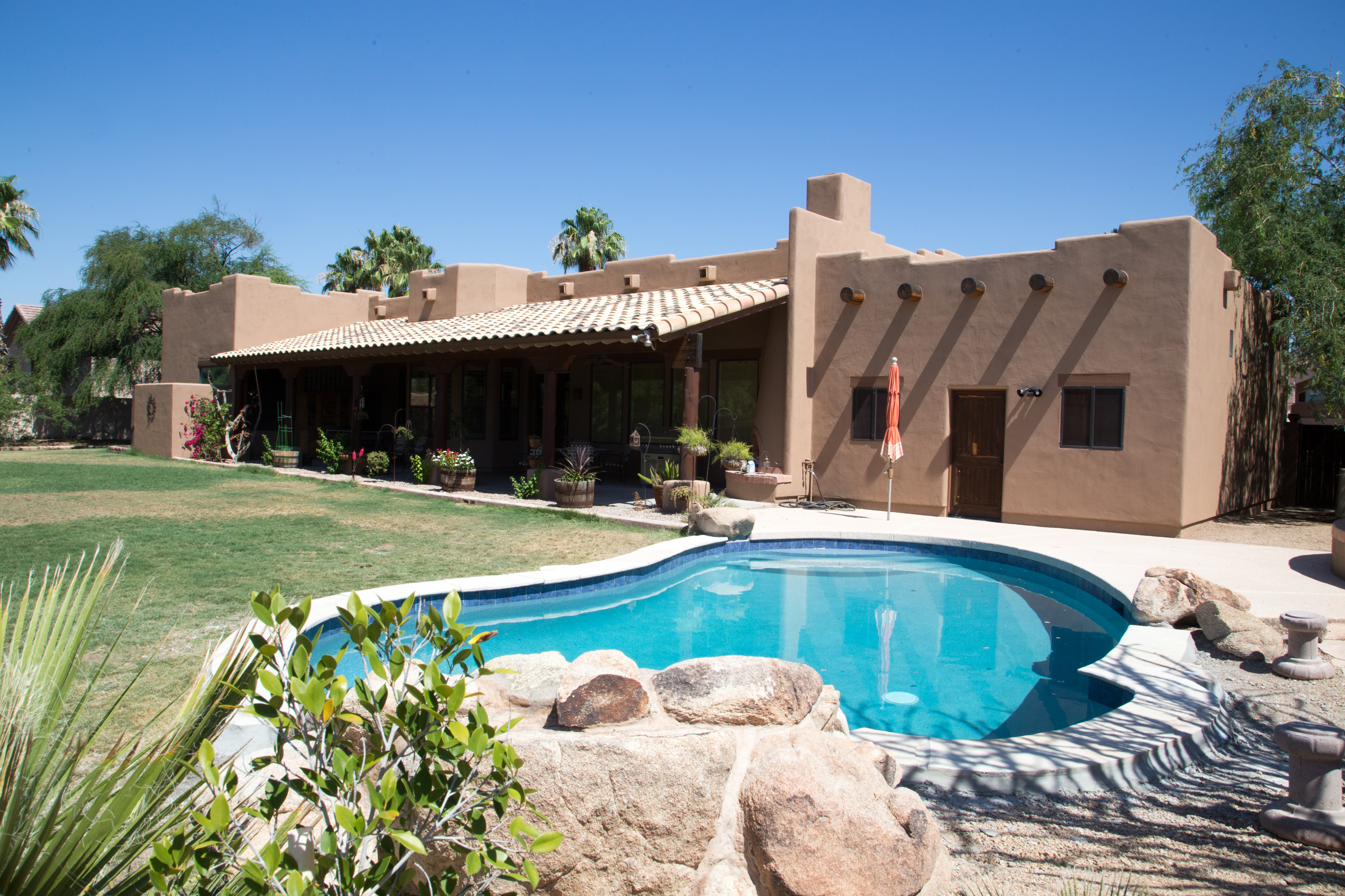 TWD was honored to work on this beautiful Phoenix home giving it new life by performing necessary stucco repairs, adding fresh exterior 2-tone paint and re-sealing the deco wood beams. [TWD Project Location: Phoenix, AZ]