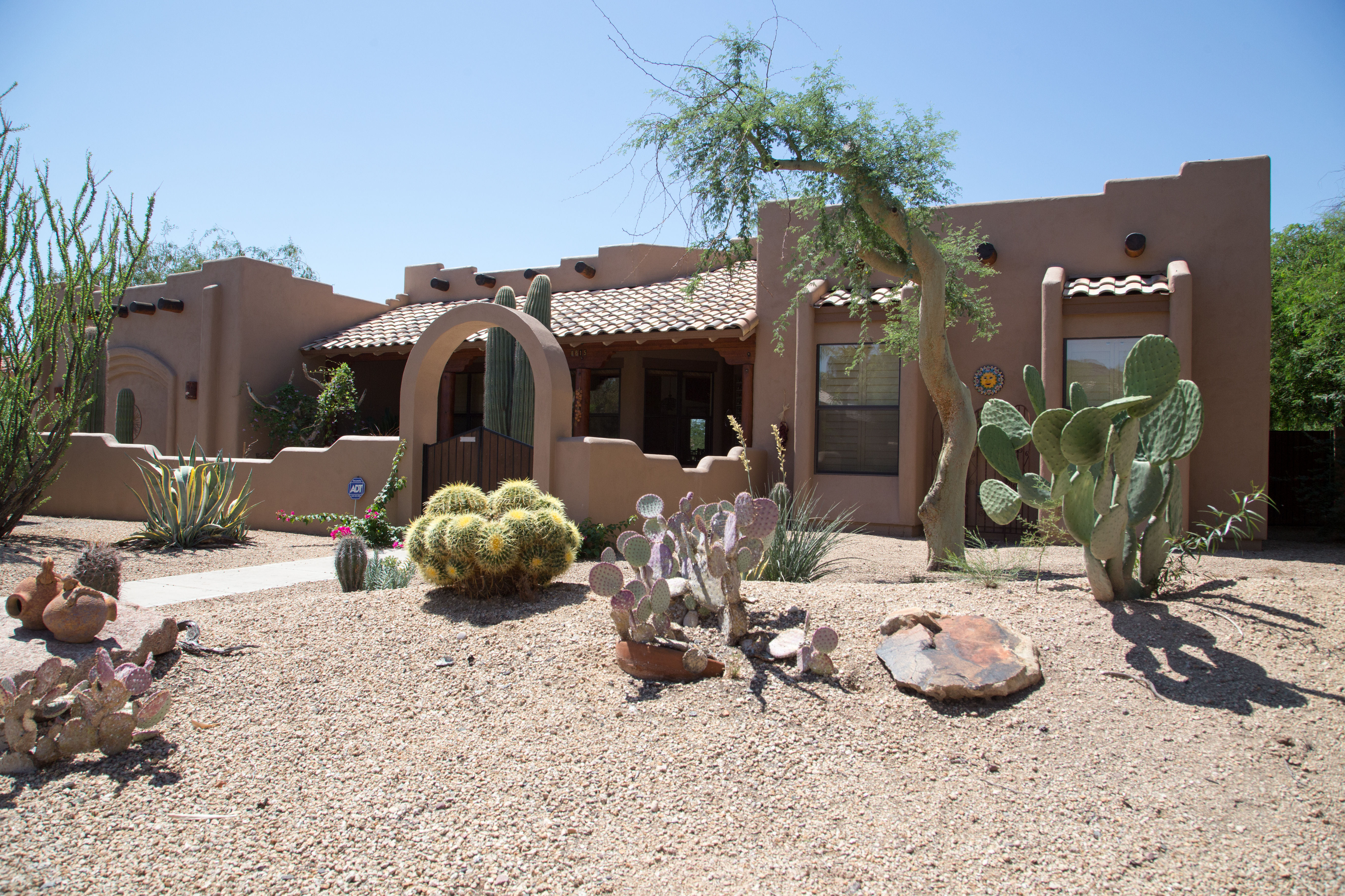 TWD was honored to work on this beautiful Phoenix home giving it new life by performing necessary stucco repairs, adding fresh exterior 2-tone paint and re-sealing the deco wood beams. [TWD Project Location: Phoenix, AZ]