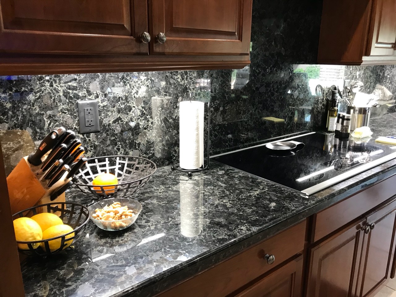 Cabinet modifications and all new Polaire Blue granite countertops and backsplash in this kitchen renovation. [TWD Project Location: Surprise, AZ]