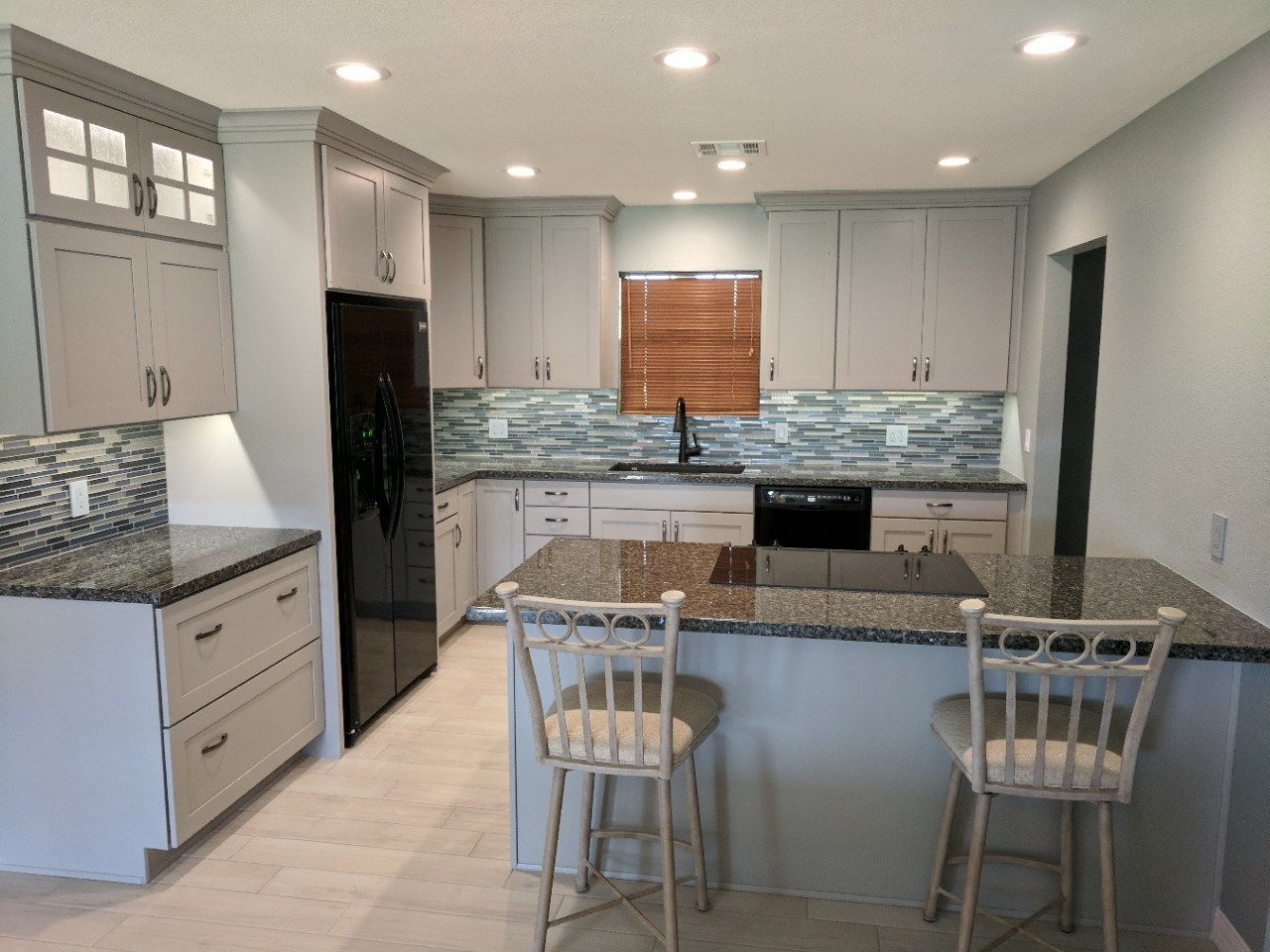 Full kitchen and bathroom remodel performed on this Valley home with a fresh new sleek feel. Complete with new Wellborn cabinetry, granite countertops, decorative mosaic backsplash, flooring and misc. upgrades throughout. [TWD Project Location: Goodyear, AZ]