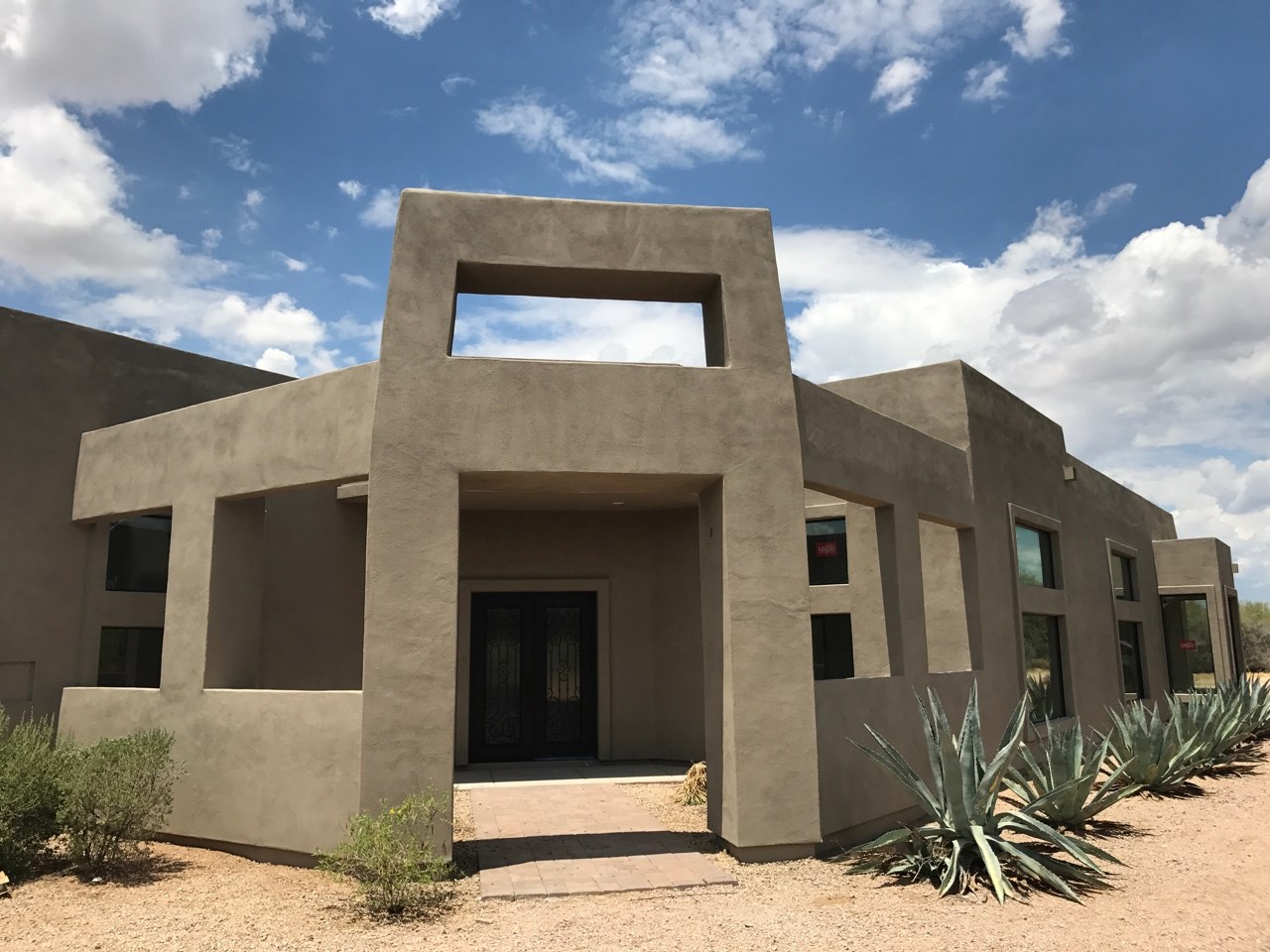 Stunning designed custom home that TWD had the pleasure of doing a parapet, windows, stucco work and exterior painting on in Scottsdale, AZ. [TWD Project]