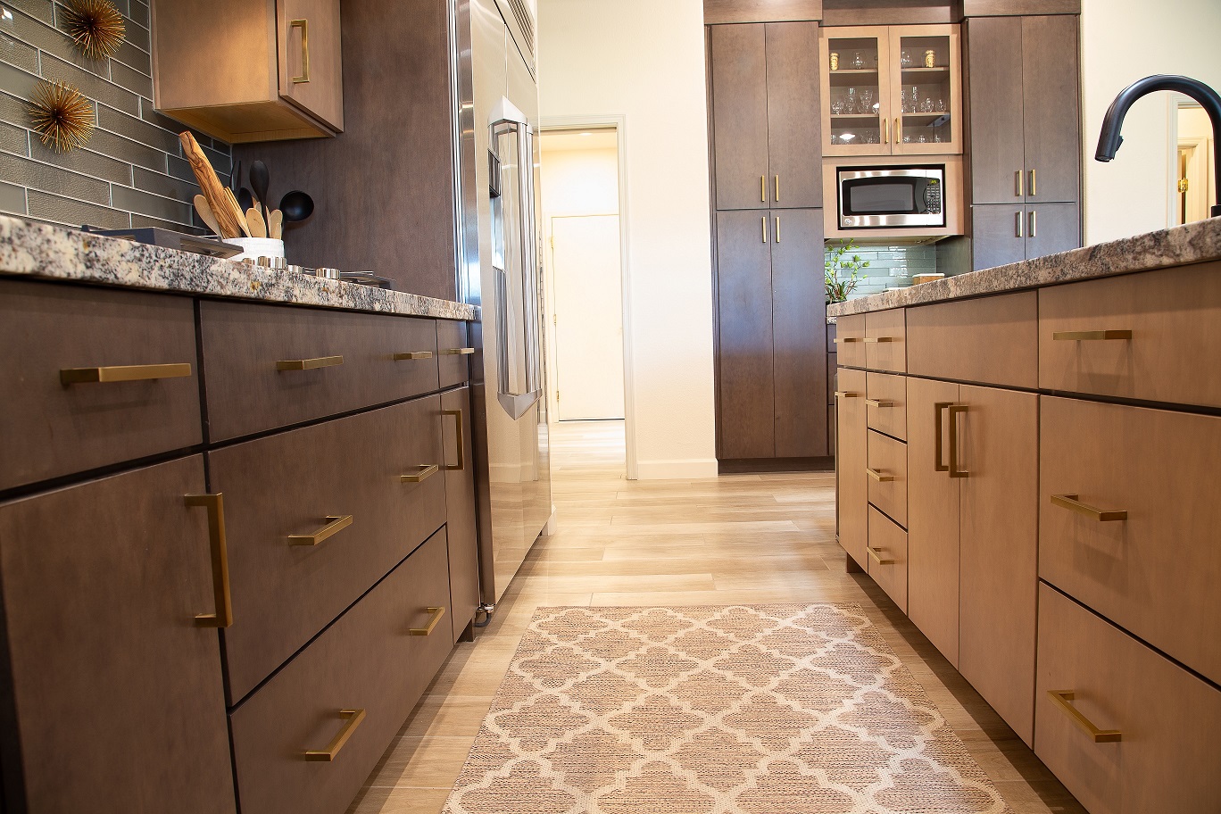 Including a separate beverage area in your kitchen remodel design allows guests and children to help themselves without disrupting the flow in the kitchen. [TWD Project Location: Sun City West, AZ]